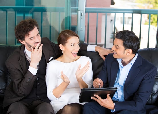Picture of a manager, financial consultant, banker presenting to young smiling married couple, business investment opportunity plan, isolated on background of city buildings. Finance smart decisions. Picture of a manager, financial consultant, banker presenting to young smiling married couple, business investment opportunity plan, isolated on background of city buildings. Finance smart decisions.